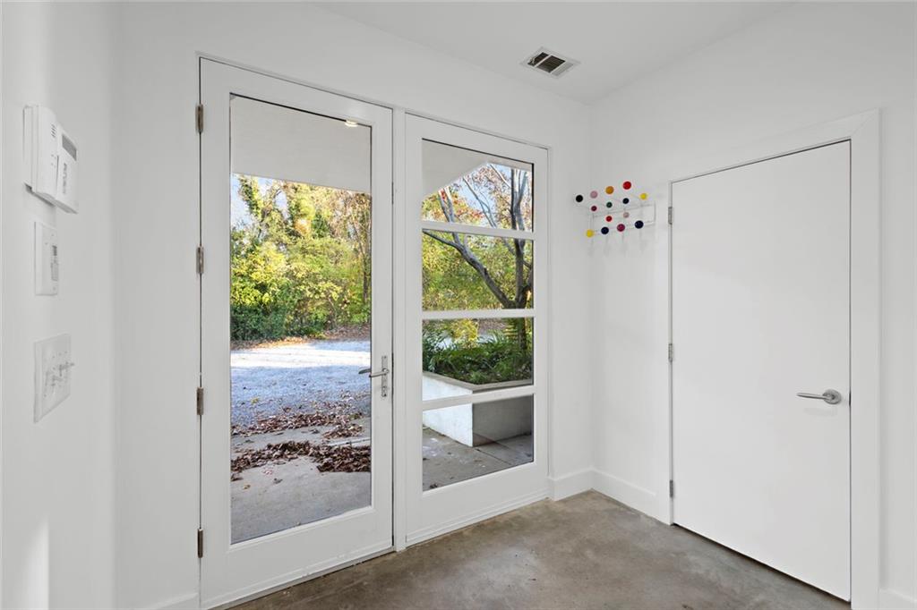 935 Custer Avenue Southeast Atlanta, GA 30316 - Photo 2 of 24 a view of a livingroom with wooden floor and a porch