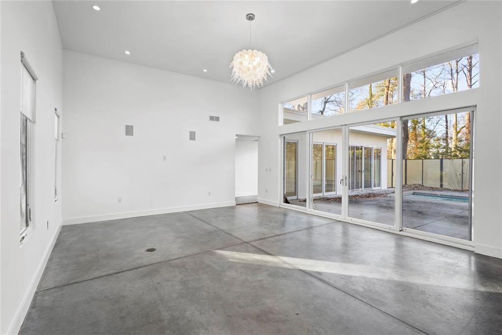 935 Custer Avenue Southeast Atlanta, GA 30316 - Photo 7 of 24 a view of an entryway with a chandelier