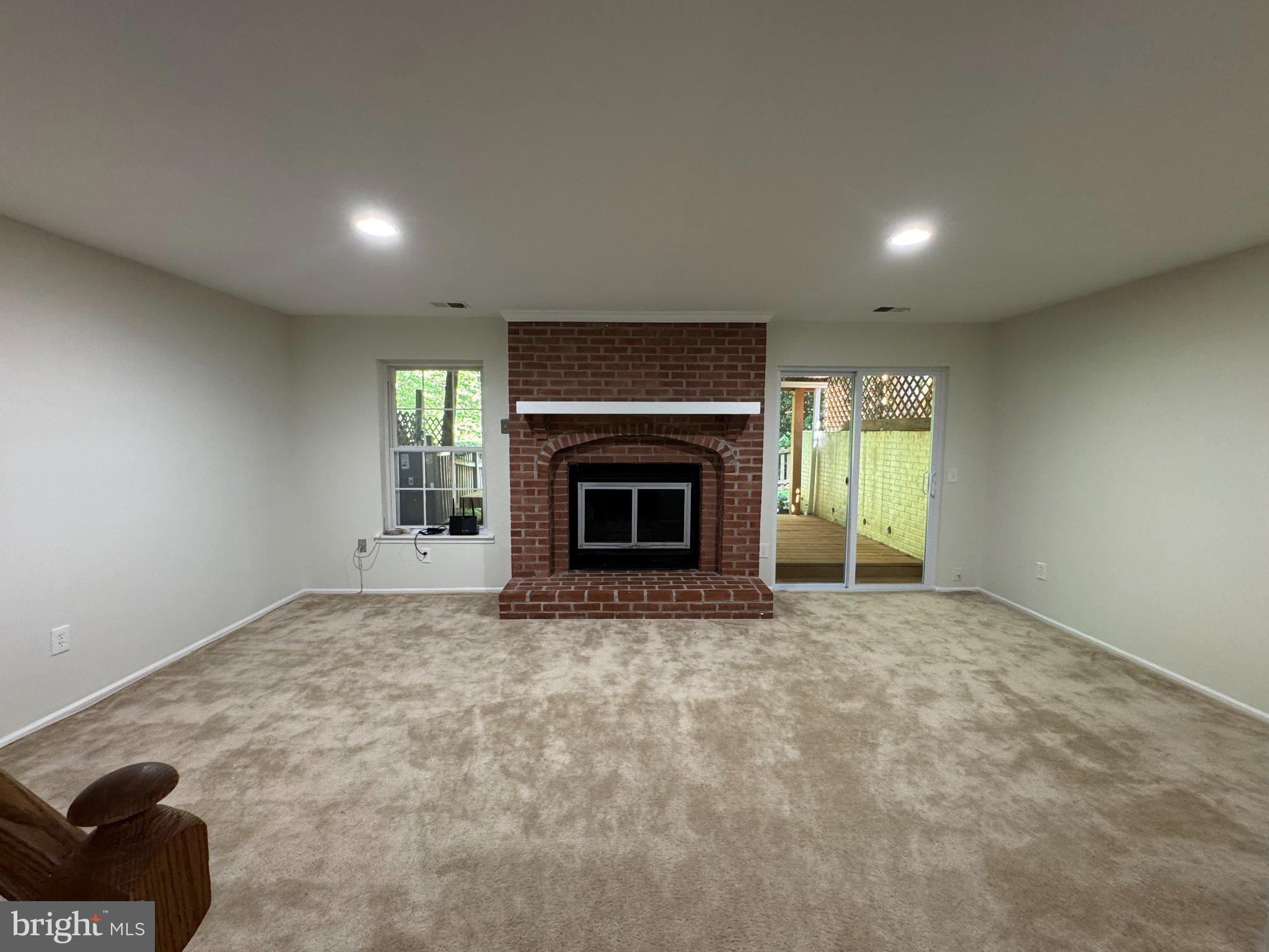 10542 Reed's Landing Circle Burke, VA 22015 - Photo 16 of 32 a view of empty room with a fireplace