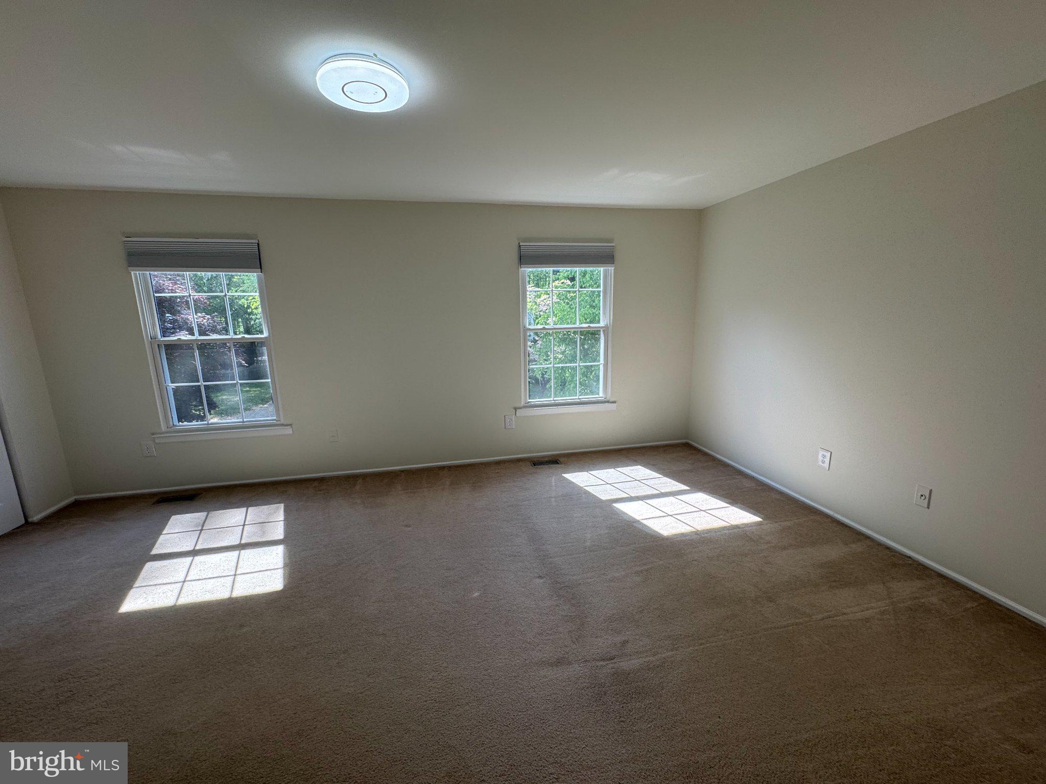 10542 Reed's Landing Circle Burke, VA 22015 - Photo 20 of 32 an empty room with windows