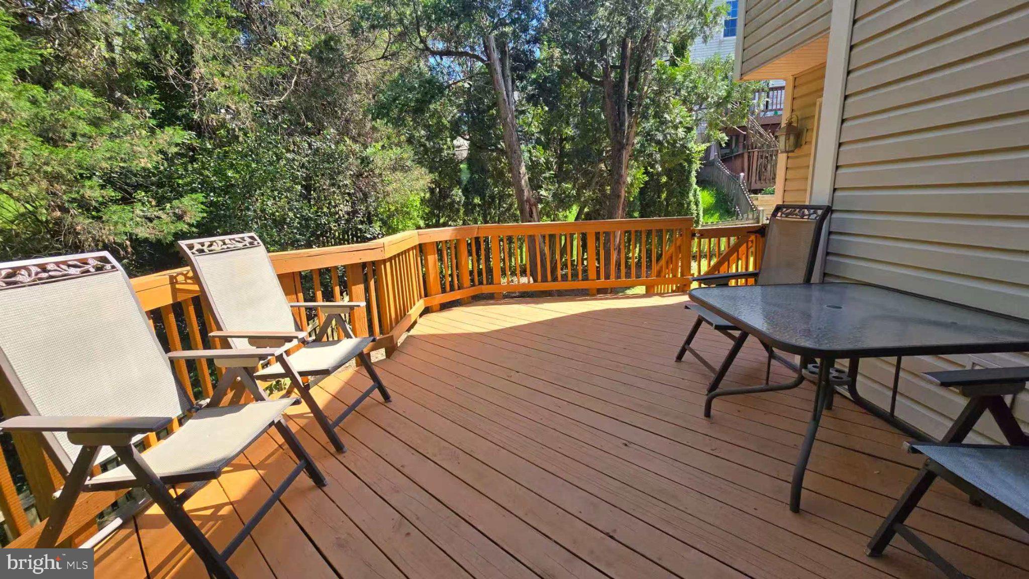 10542 Reed's Landing Circle Burke, VA 22015 - Photo 25 of 32 a view of a chairs on wooden deck