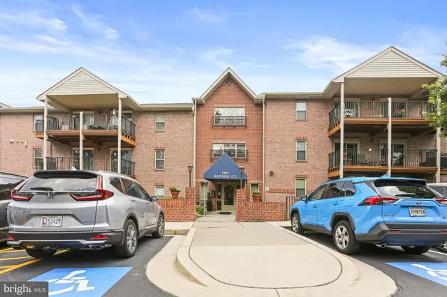 a car parked in front of a house