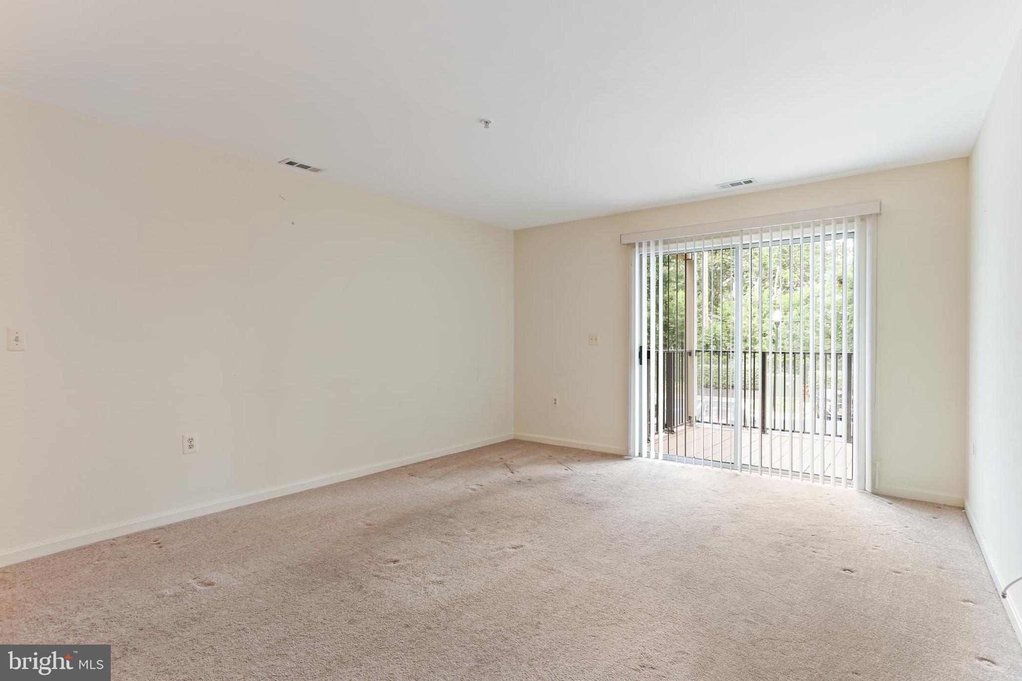 3907 Hannon Court, Unit 2A Baltimore, MD 21236 - Photo 11 of 34 a view of an empty room with a window
