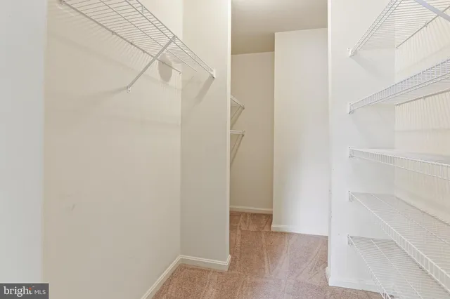 a view of a balcony with wooden floor