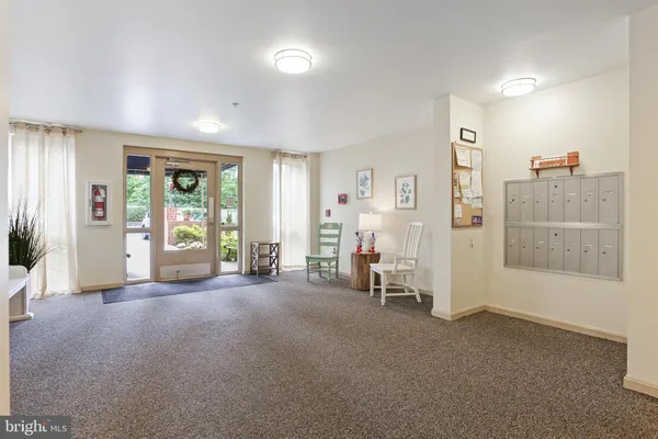 a view of empty room with floor to ceiling window