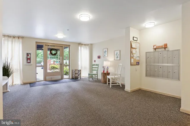 a view of empty room with floor to ceiling window