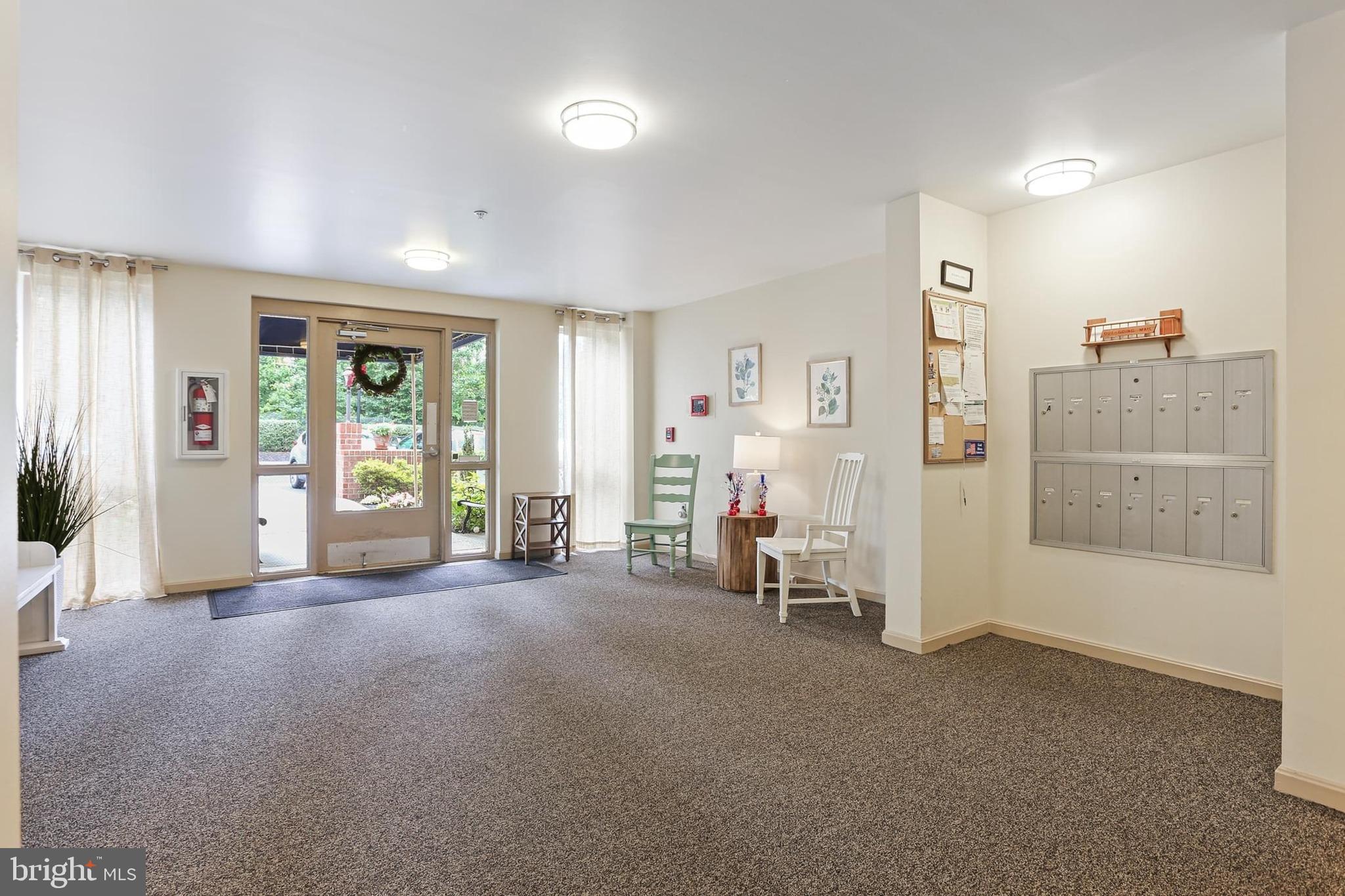 3907 Hannon Court, Unit 2A Baltimore, MD 21236 - Photo 2 of 34 a view of empty room with floor to ceiling window