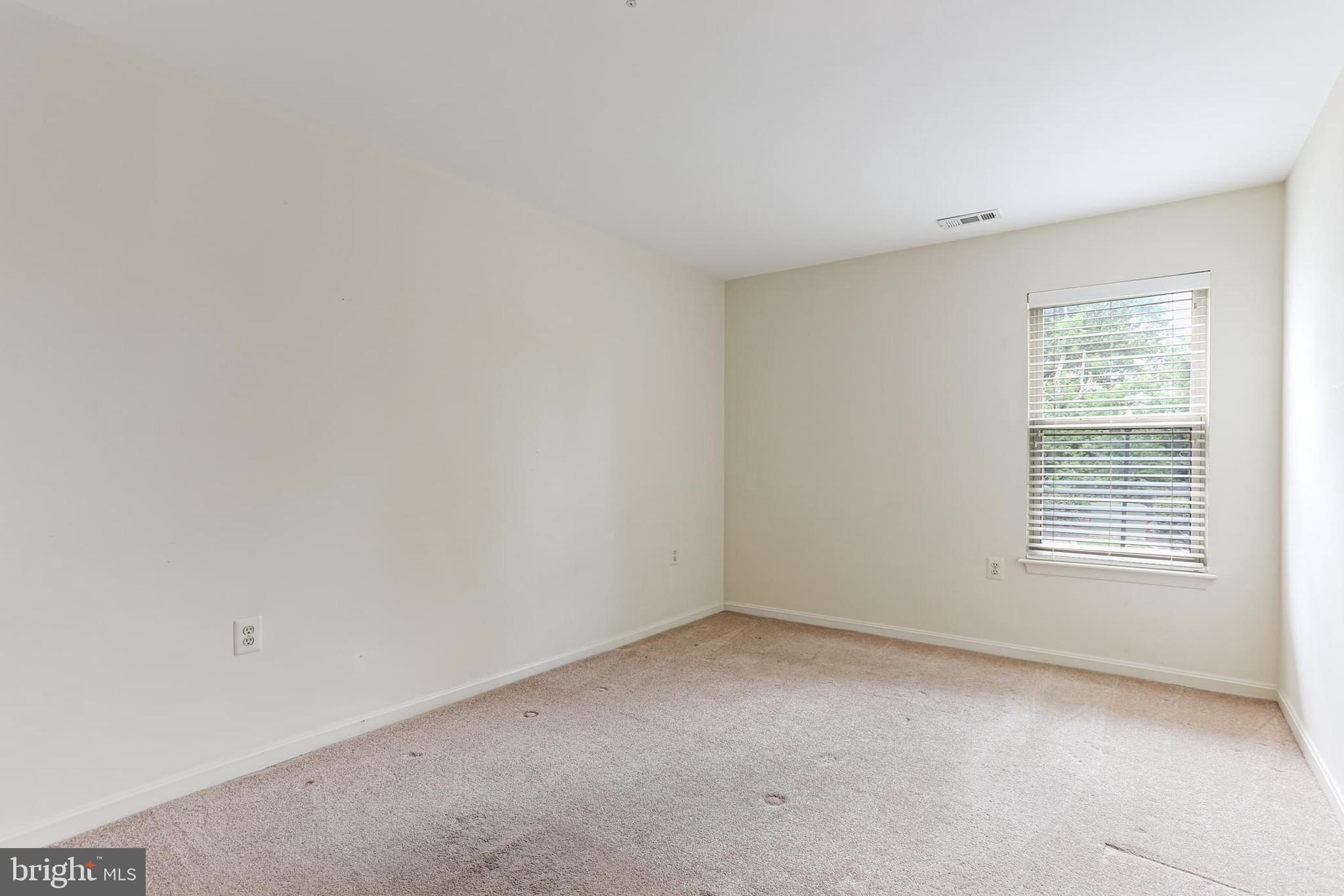 3907 Hannon Court, Unit 2A Baltimore, MD 21236 - Photo 27 of 34 an empty room with a window