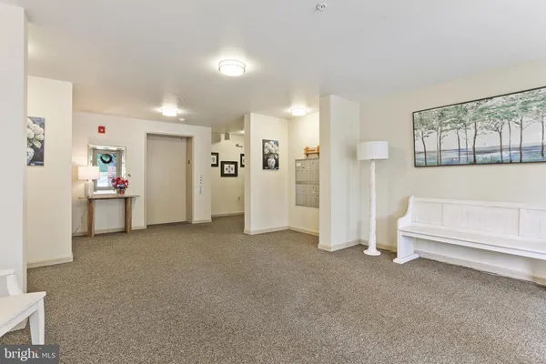 a view of hallway with livingroom