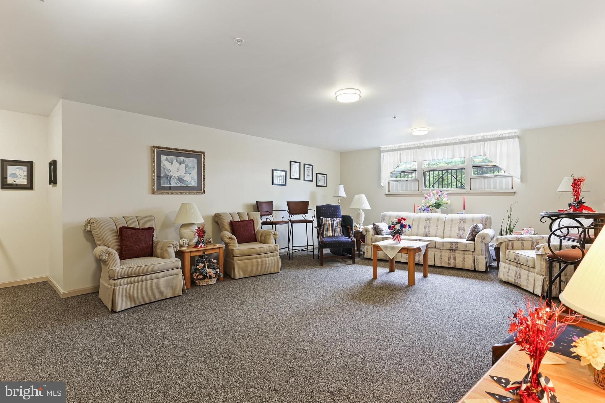 3907 Hannon Court, Unit 2A Baltimore, MD 21236 - Photo 31 of 34 a living room with furniture and a window
