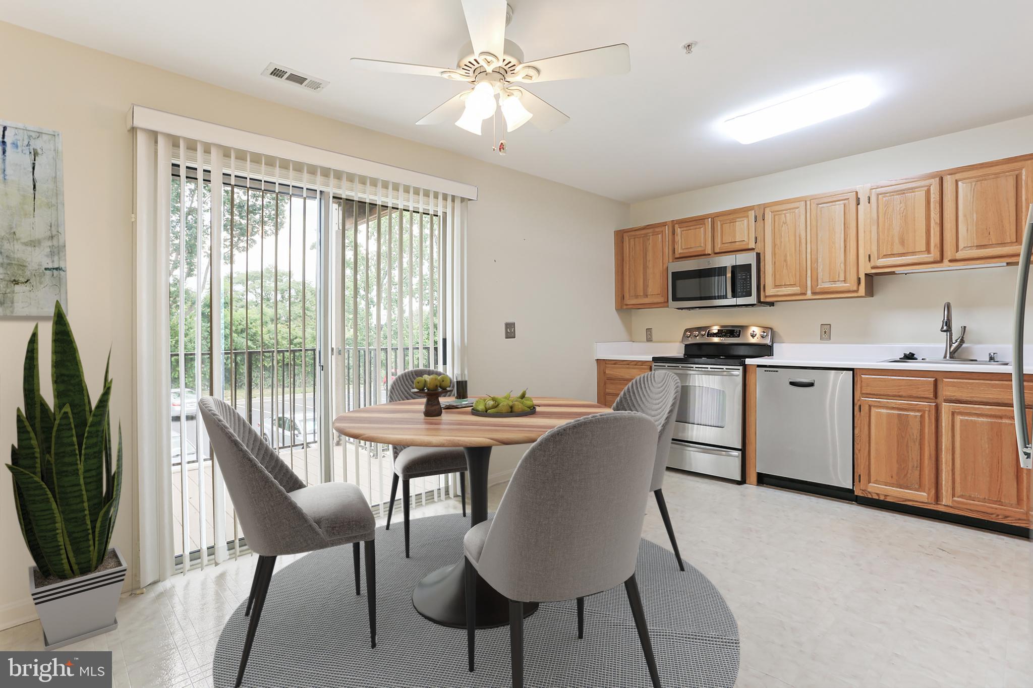 3907 Hannon Court, Unit 2A Baltimore, MD 21236 - Photo 6 of 34 a view of kitchen with furniture wooden floor and a window