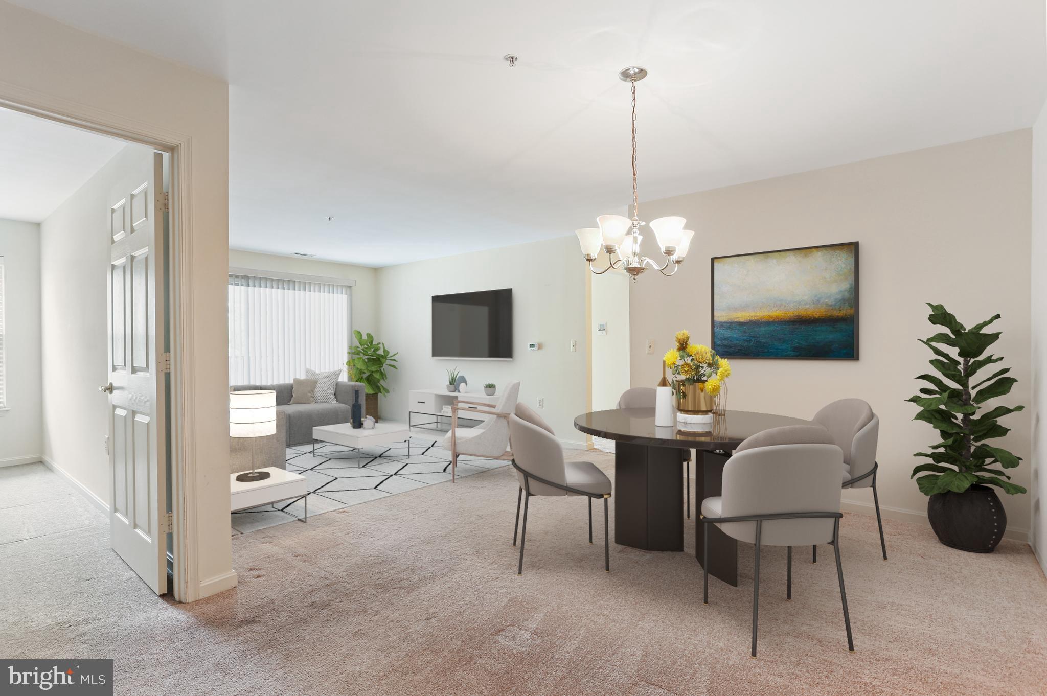 3907 Hannon Court, Unit 2A Baltimore, MD 21236 - Photo 10 of 34 a living room with furniture a chandelier and a flat screen tv