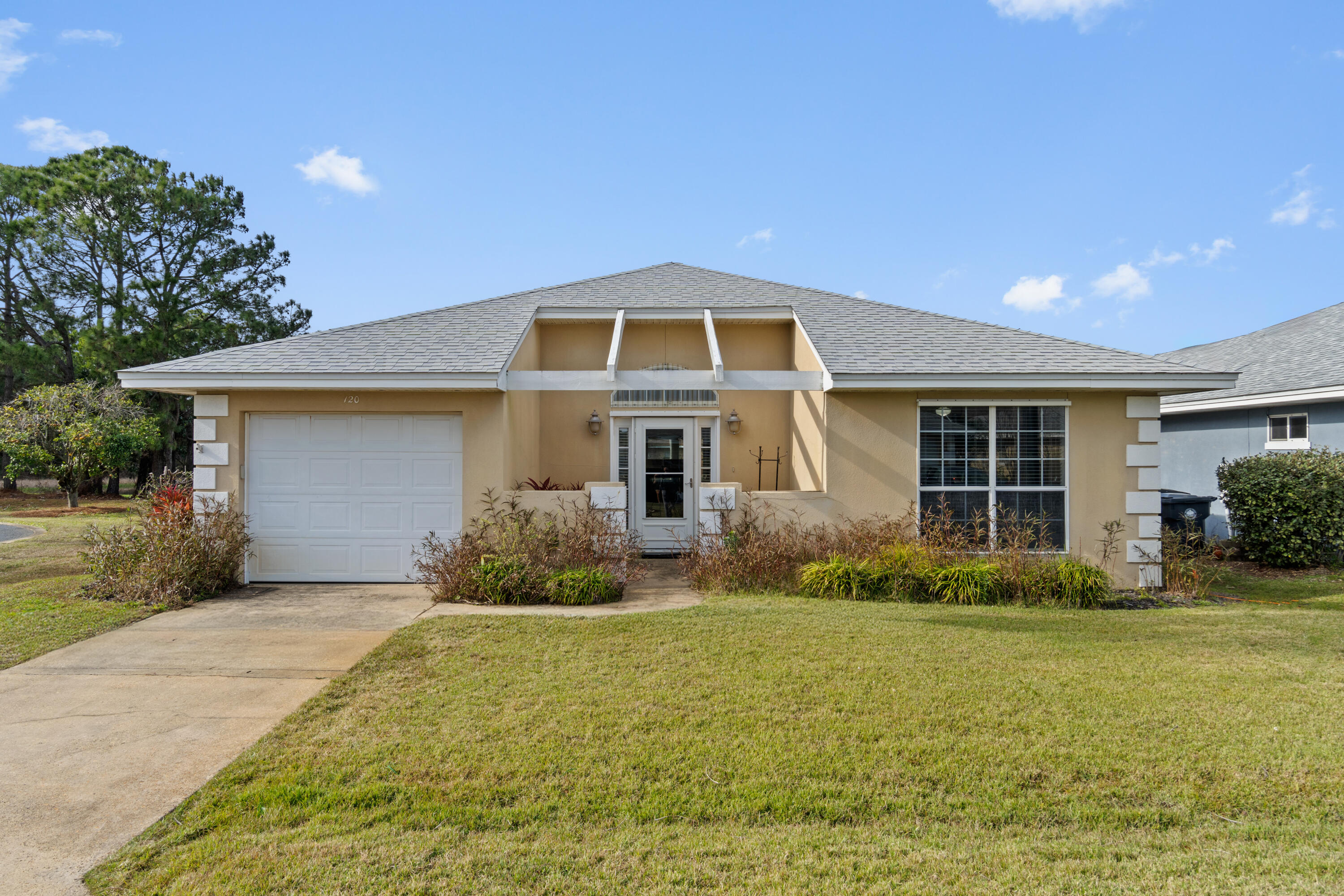 120 Hibiscus Lane Miramar Beach, FL 32550 - Photo 1 of 57 a front view of house with yard and green space