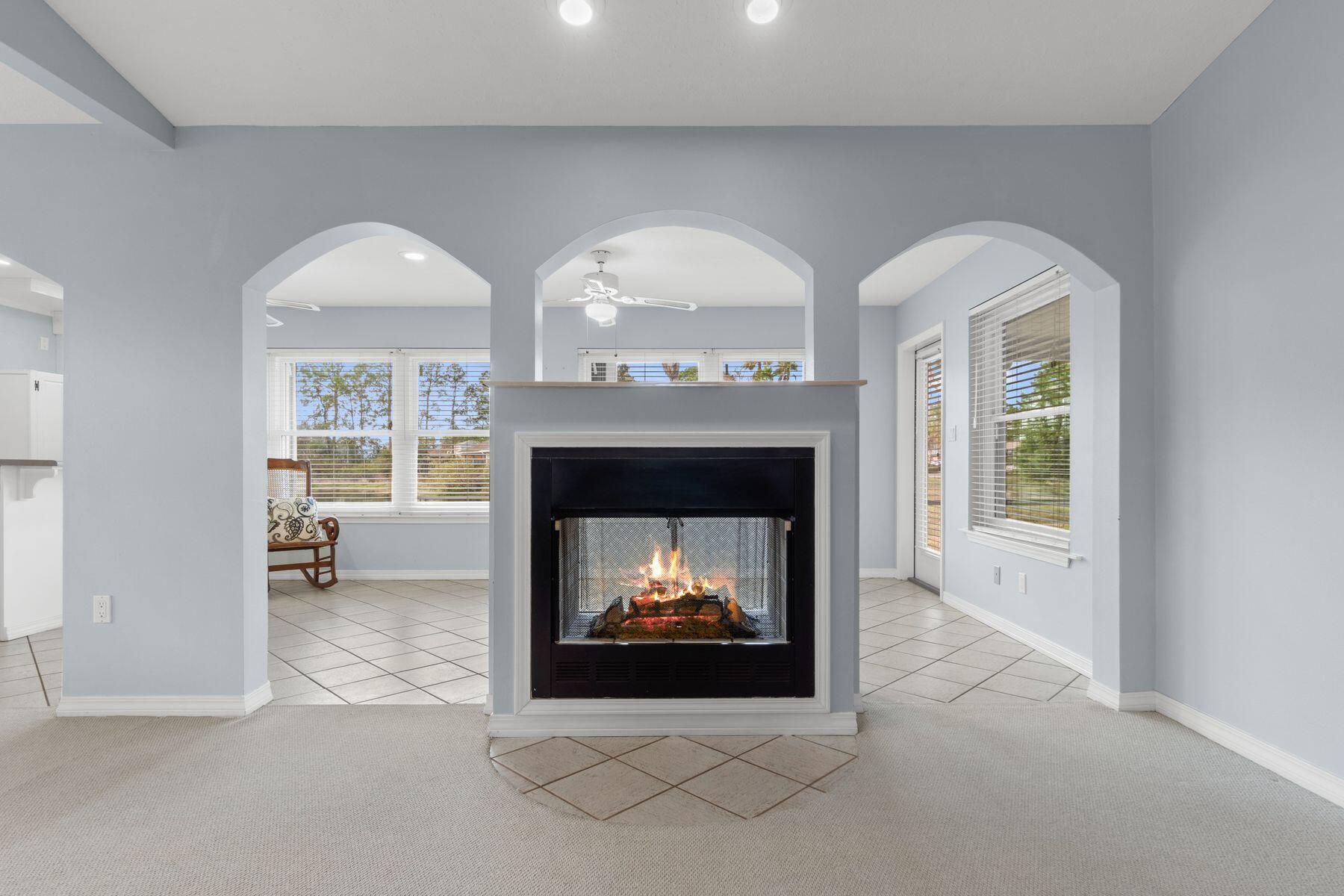 120 Hibiscus Lane Miramar Beach, FL 32550 - Photo 11 of 57 a living room with furniture and a fireplace