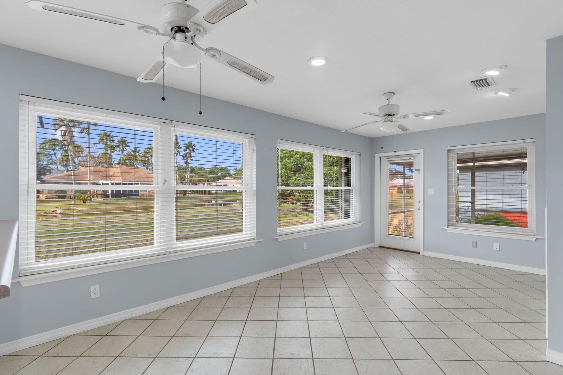 120 Hibiscus Lane Miramar Beach, FL 32550 - Photo 12 of 57 a view of an empty room with a window and chandelier fan