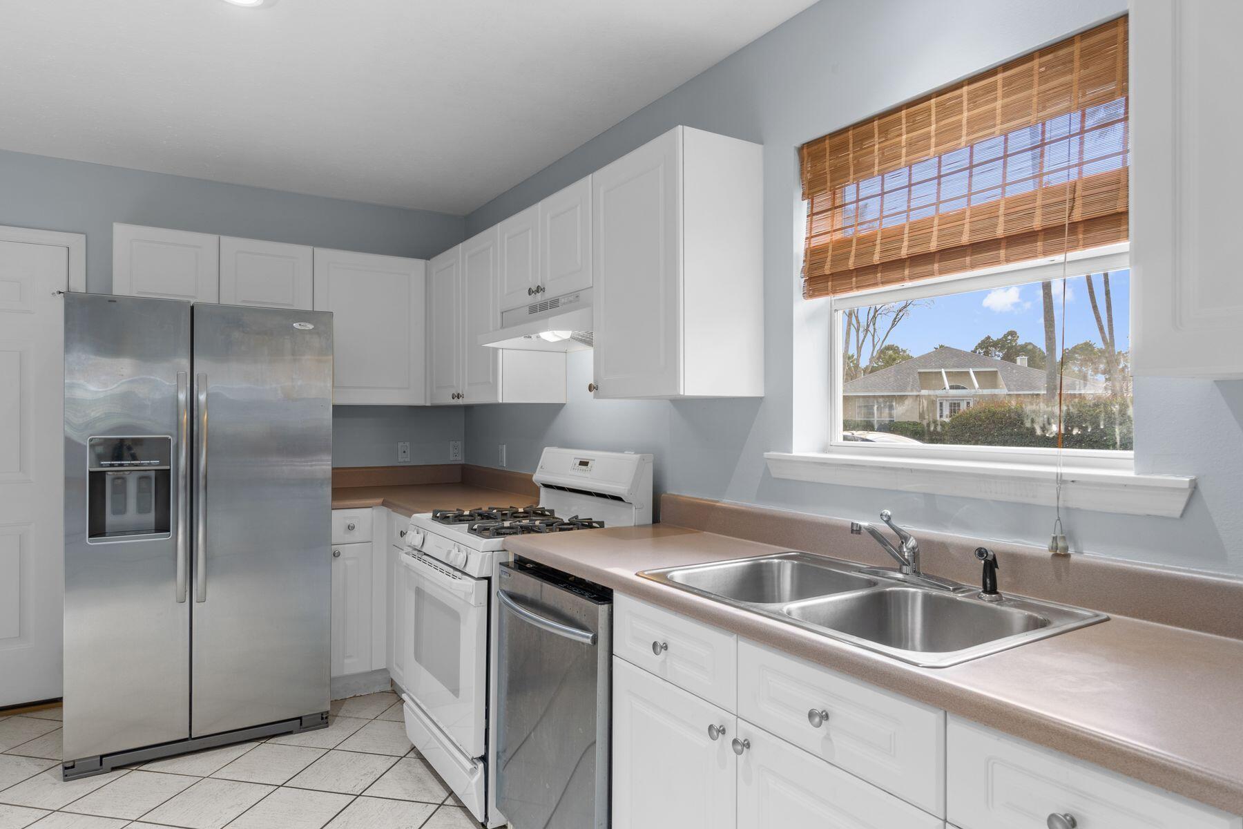 120 Hibiscus Lane Miramar Beach, FL 32550 - Photo 19 of 57 a kitchen that has a sink cabinets counter space and appliances