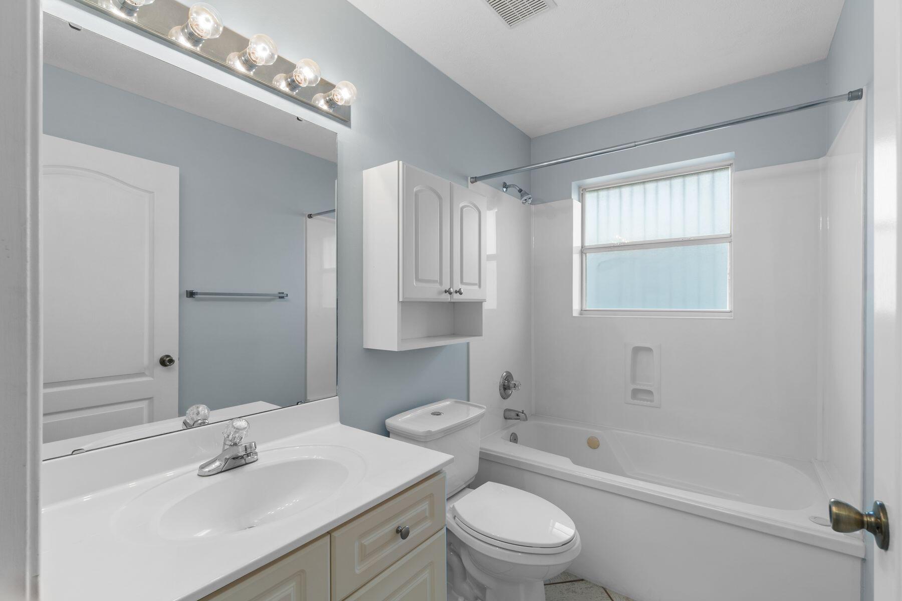 120 Hibiscus Lane Miramar Beach, FL 32550 - Photo 29 of 57 a bathroom with a sink a toilet and shower