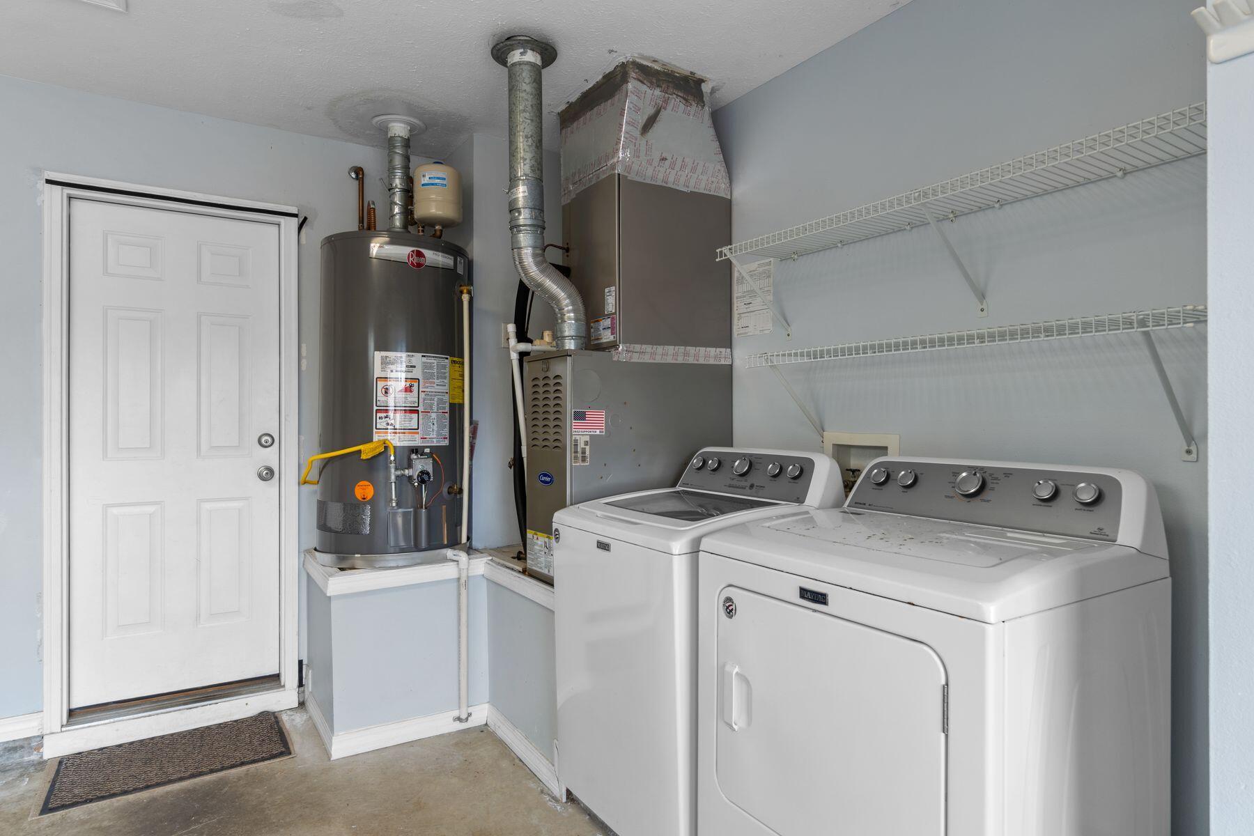 120 Hibiscus Lane Miramar Beach, FL 32550 - Photo 31 of 57 a utility room with dryer and washer