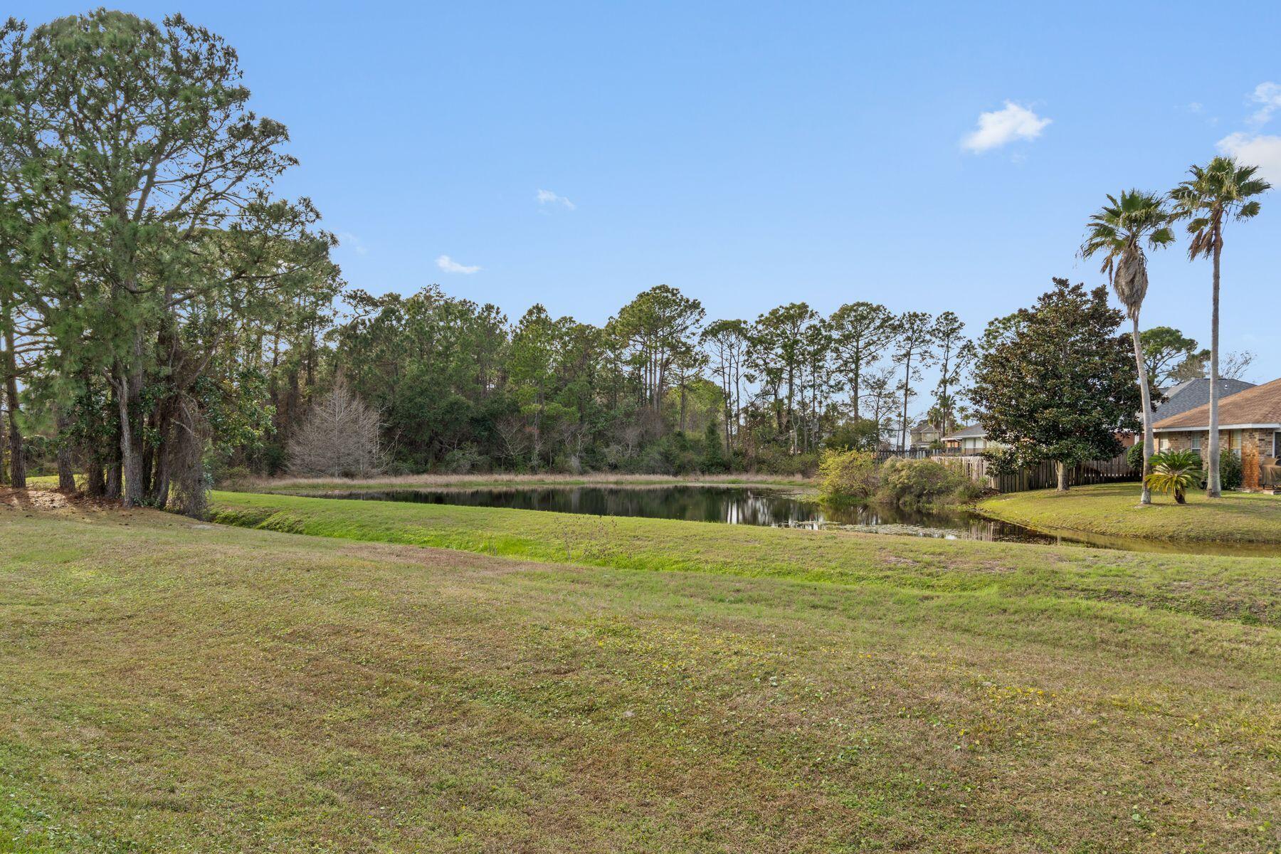 120 Hibiscus Lane Miramar Beach, FL 32550 - Photo 33 of 57 a view of a water fountain and a big yard