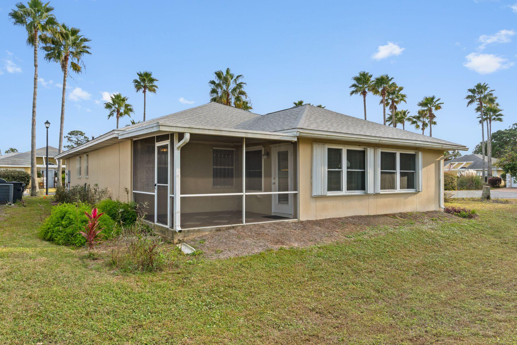 120 Hibiscus Lane Miramar Beach, FL 32550 - Photo 35 of 57 a large tree in front of a house