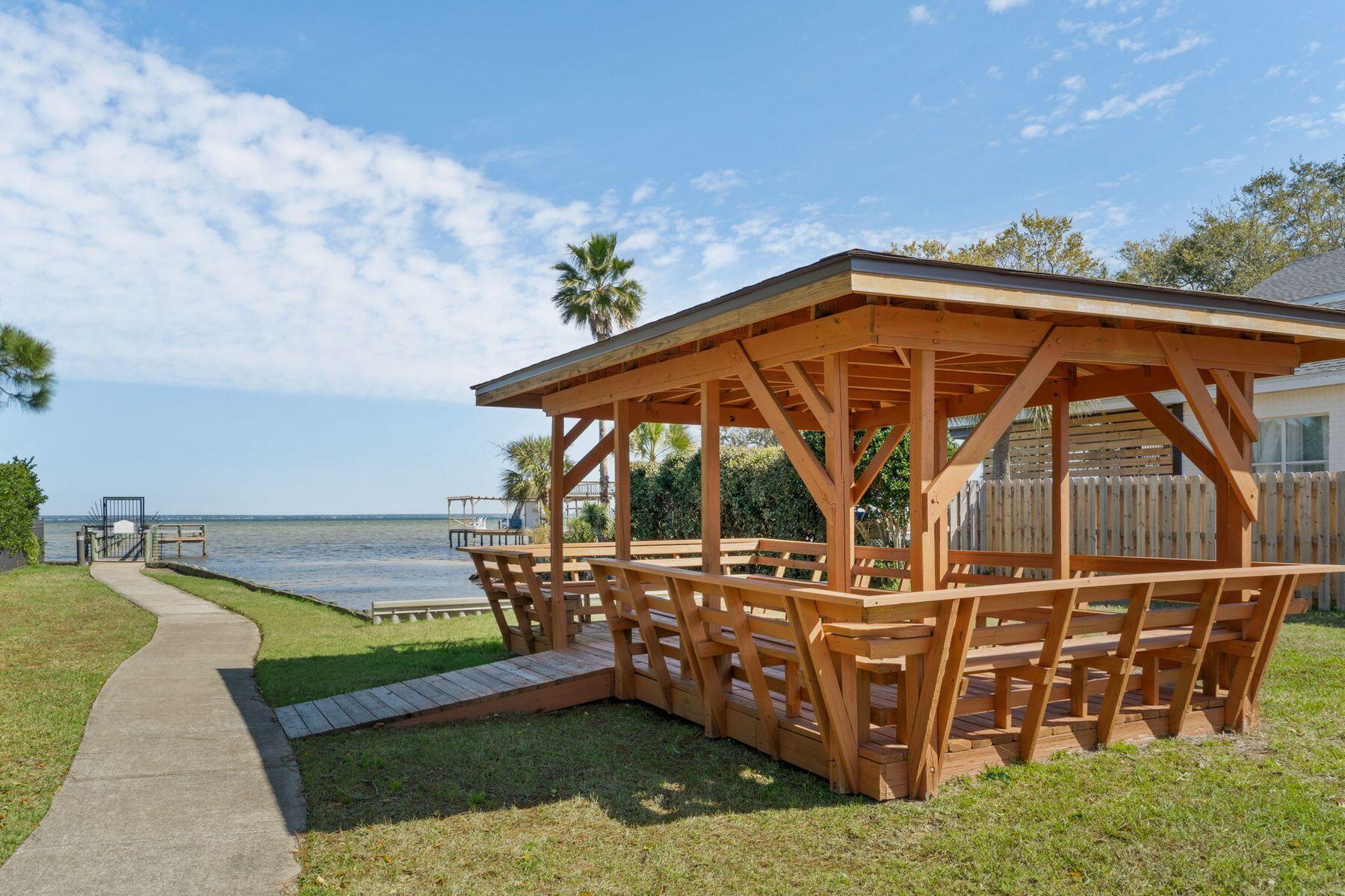 120 Hibiscus Lane Miramar Beach, FL 32550 - Photo 46 of 57 a view of a backyard with sitting area