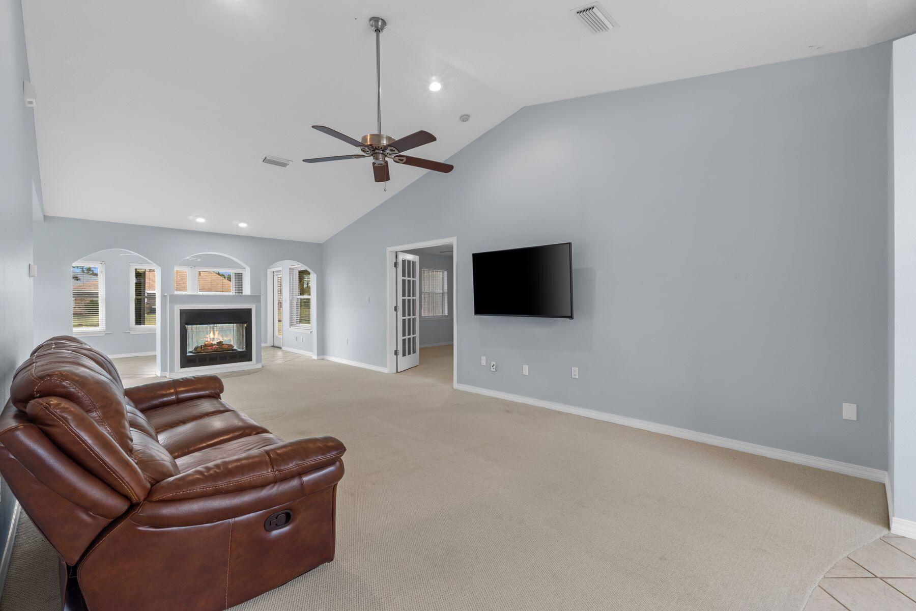 120 Hibiscus Lane Miramar Beach, FL 32550 - Photo 7 of 57 a living room with furniture and a flat screen tv