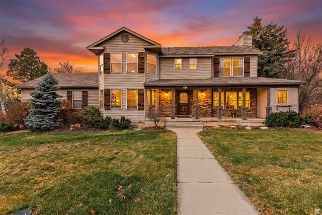 706 Bateman Lane Alpine, UT 84004 - Photo 1 of 1 Traditional-style house with a porch, a front yard, and a chimney