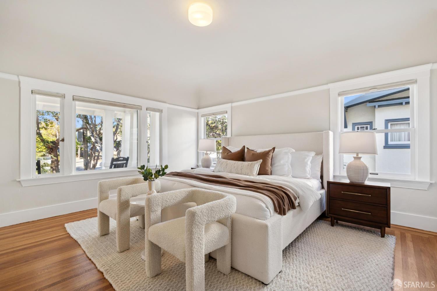 1968 Marin Avenue Berkeley, CA 94707 - Photo 34 of 75 a bedroom with a bed and wooden floor