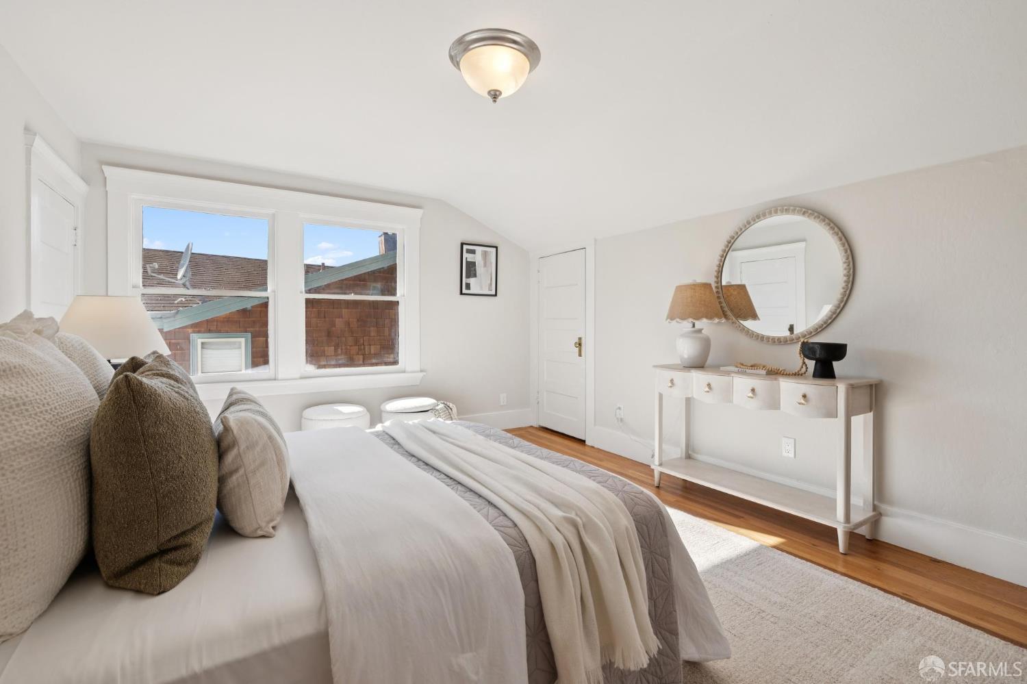 1968 Marin Avenue Berkeley, CA 94707 - Photo 40 of 75 a bedroom with a bed and a dresser next to a window