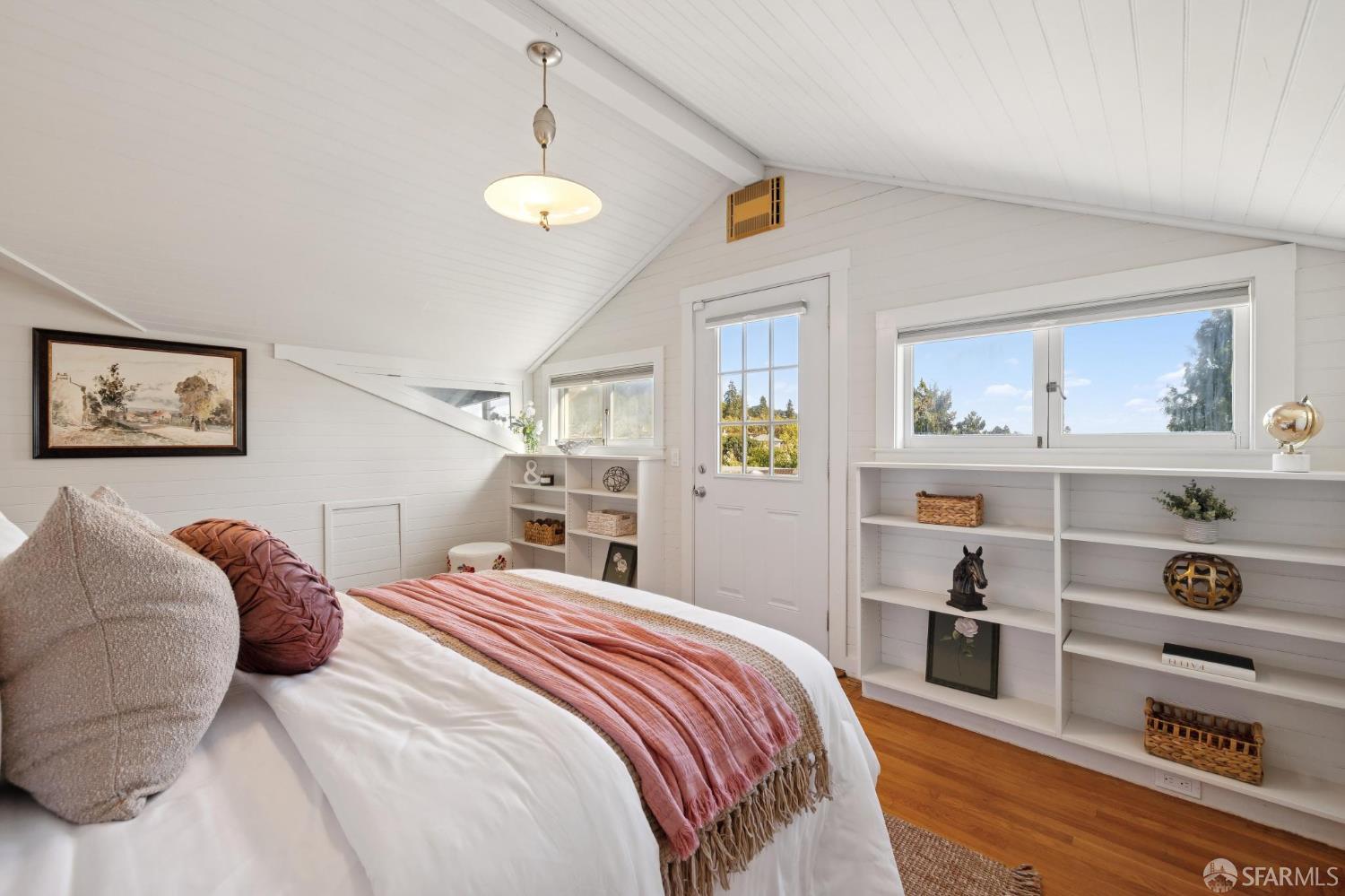 1968 Marin Avenue Berkeley, CA 94707 - Photo 43 of 75 a bedroom with a bed and a book shelf