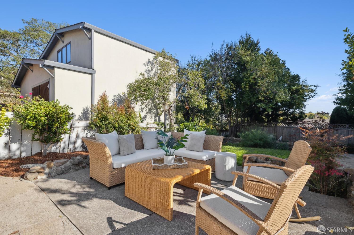 1968 Marin Avenue Berkeley, CA 94707 - Photo 59 of 75 a view of a patio with couches table and chairs and potted plants