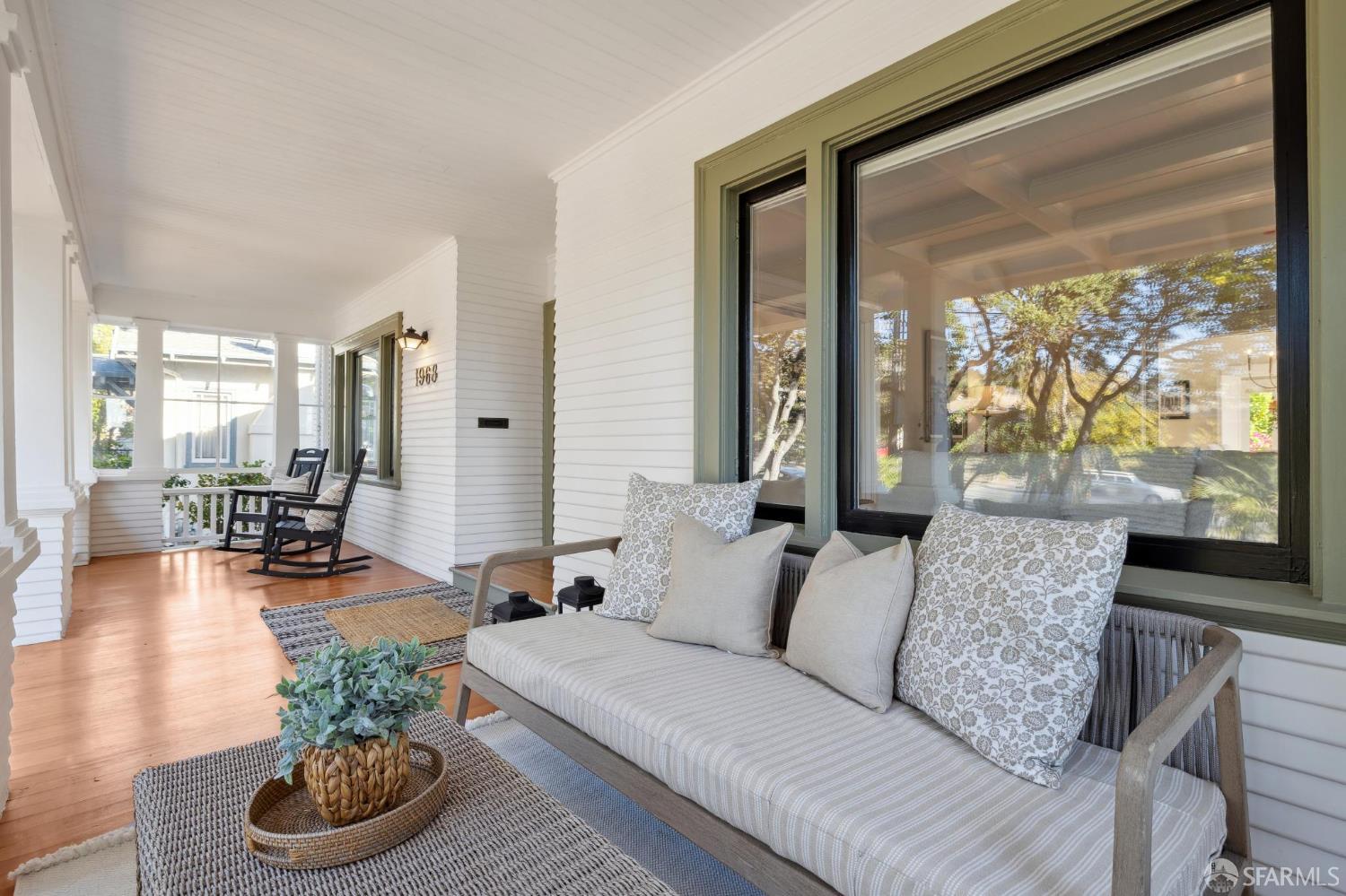 1968 Marin Avenue Berkeley, CA 94707 - Photo 6 of 75 a living room with furniture and a large window