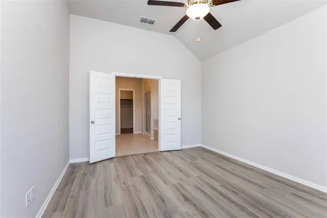 a view of kitchen with sink microwave and stove
