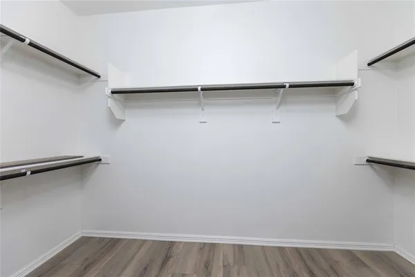 a white bath tub sitting next to a window