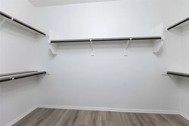 a white bath tub sitting next to a window