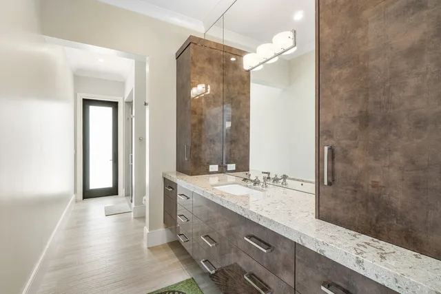 a spacious bedroom with a bed and a couch