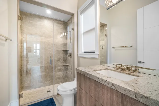 a view of a house with backyard sitting area and porch