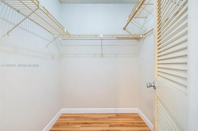 a view of a room with racks on the wall