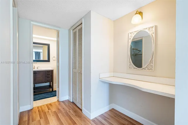 a view of a bedroom from a hallway