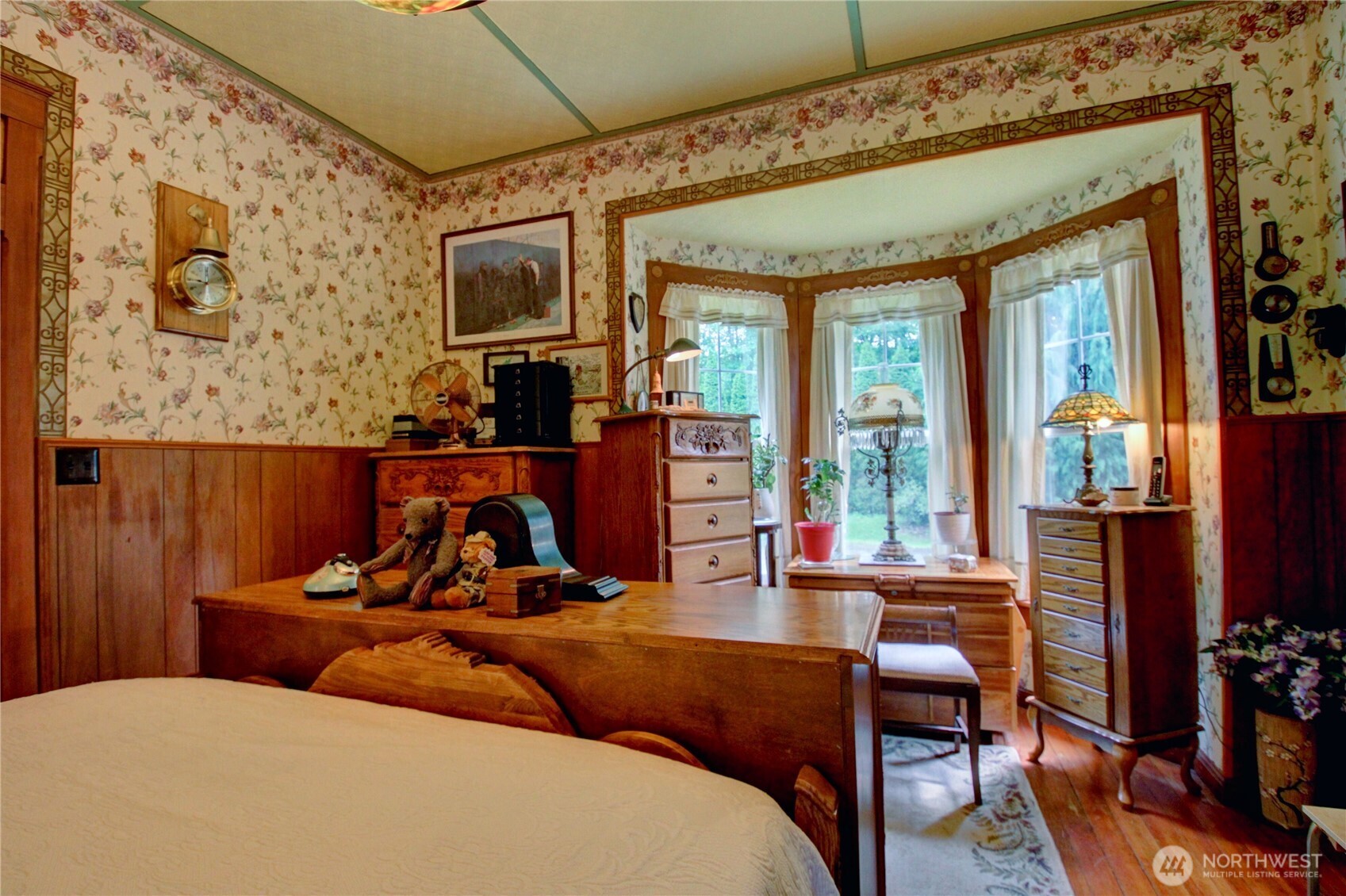 2909 Overpass Road Bow, WA 98232 - Photo 13 of 40 a bed room with a bed and a tv