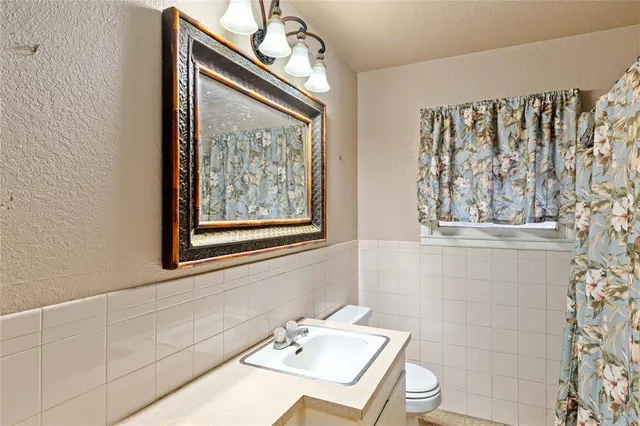 a view of room with window and hardwood floor