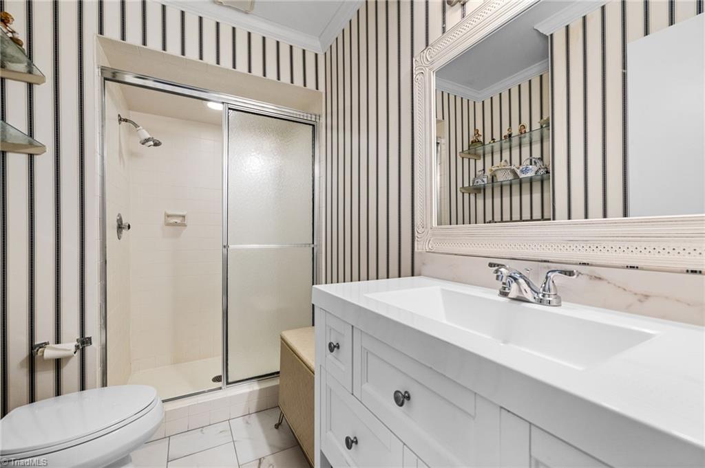 1101 Gatehouse Road High Point, NC 27262 - Photo 19 of 26 Primary bedroom en-suite.
