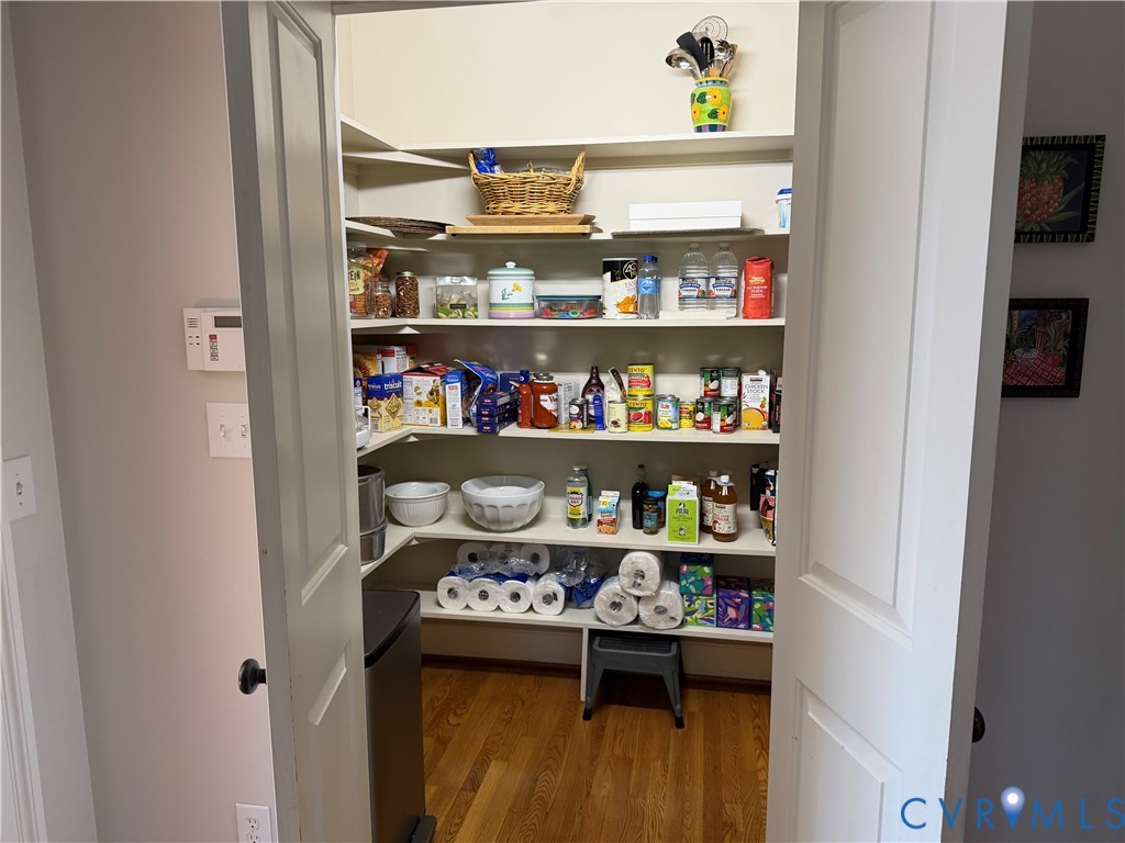 8947 Cherokee Road Richmond, VA 23235 - Photo 17 of 45 a view of store room with wooden floor
