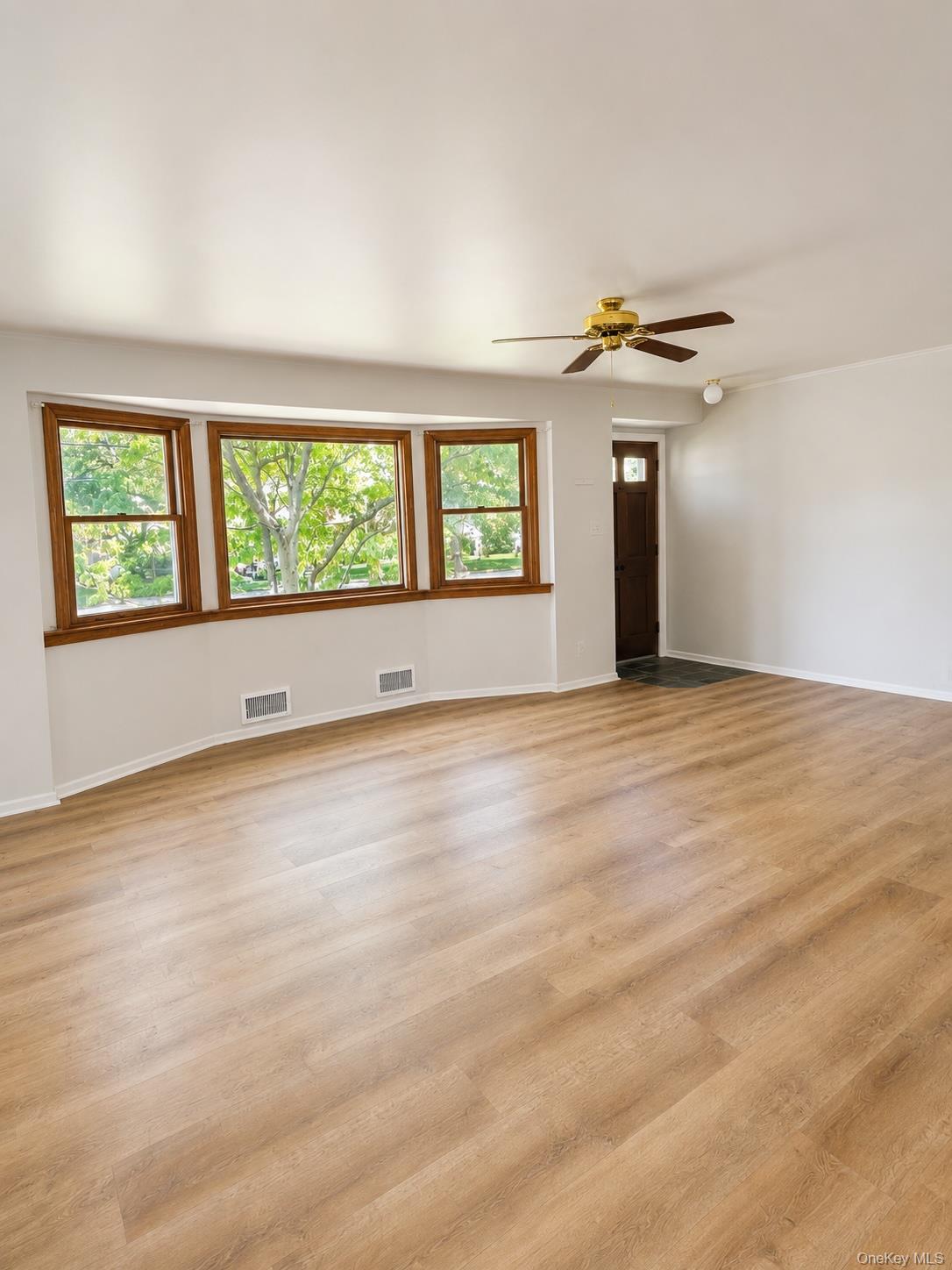 16 Clay Pitts Road Greenlawn, NY 11740 - Photo 4 of 25 Family room second angle