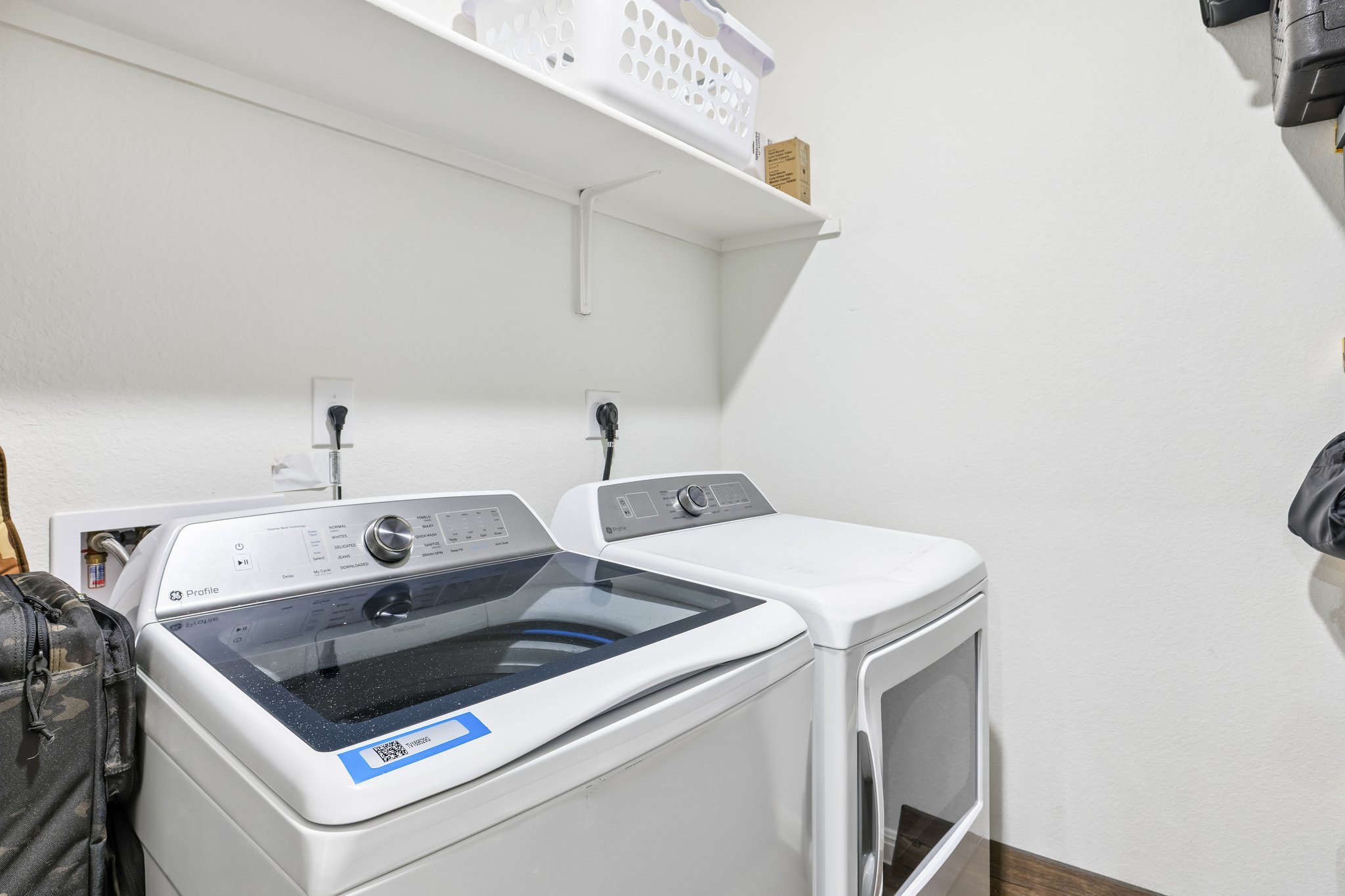 19105 Mike Mansfield Road Manor, TX 78653 - Photo 18 of 28 a utility room with dryer and washer