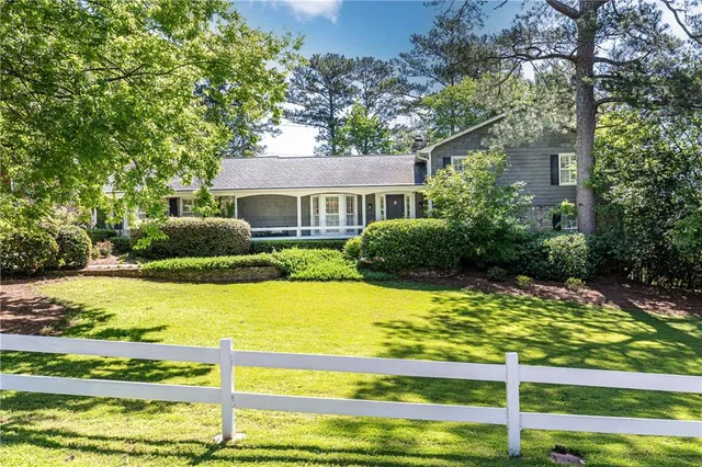 a house view with a swimming pool