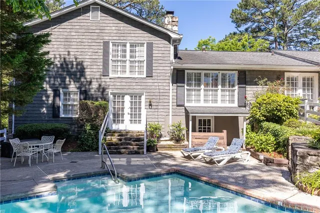 a view of house with a patio