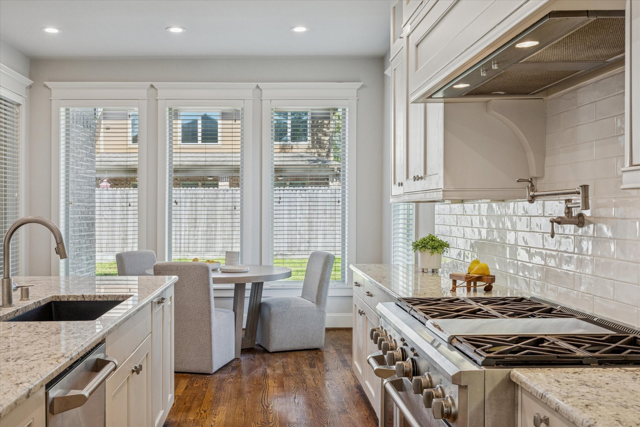 1802 Wakefield Drive Houston, TX 77018 - Photo 2 of 47 Charming kitchen nook with abundant natural light and a serene view of the backyard.
