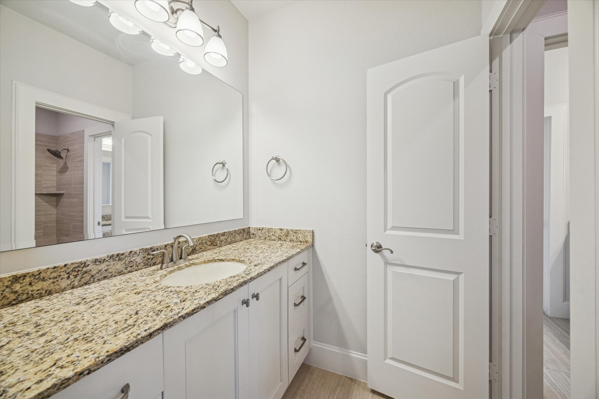 1802 Wakefield Drive Houston, TX 77018 - Photo 34 of 47 Spacious guest bathroom countertop providing room for convenience and organization.