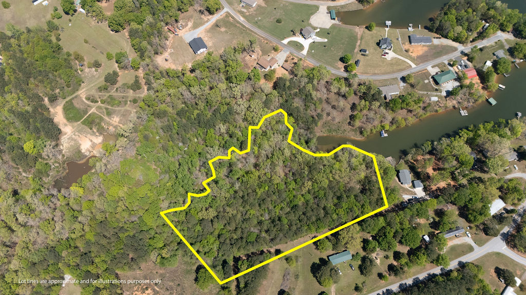 0 Bulldog Road Iva, SC 29655 - Photo 20 of 20 A spacious wooded lot positioned near the tranquil water's edge.